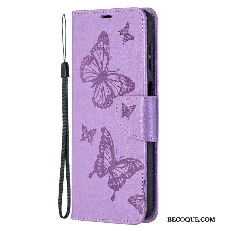 Flip Case Samsung Galaxy M12 / A12 Perhosia Lennossa Lanyardin Kanssa