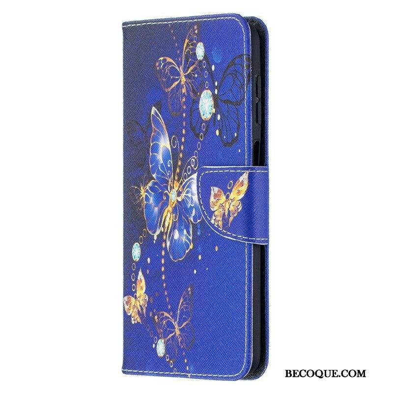 Nahkakotelo Samsung Galaxy M12 / A12 Kultaiset Perhoset