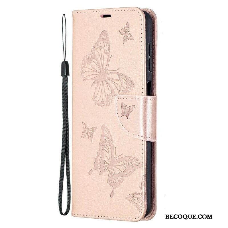 Flip Case Samsung Galaxy M12 / A12 Perhosia Lennossa Lanyardin Kanssa